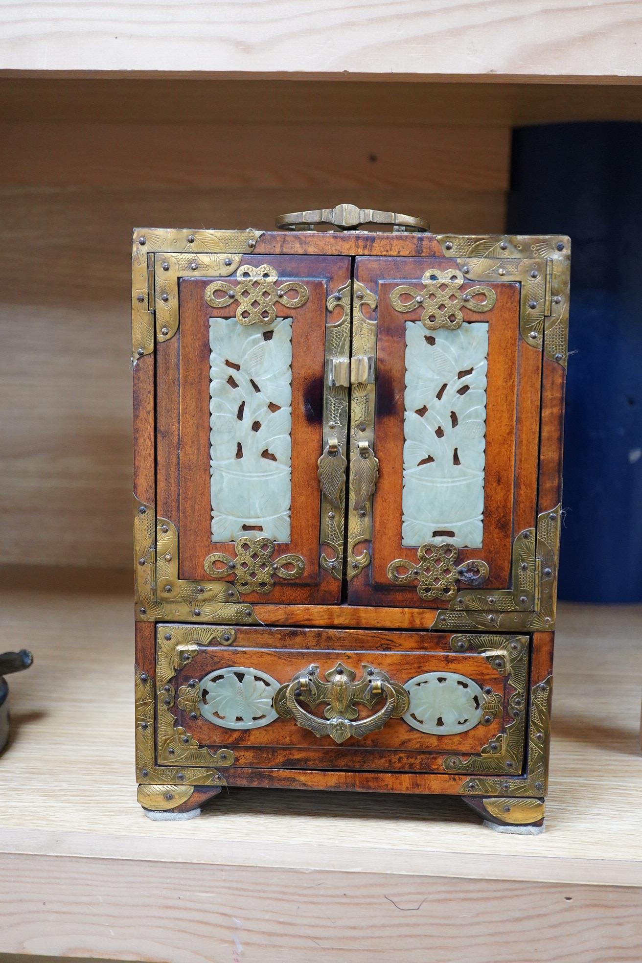 A Chinese walnut jewellery box with carved bowenite jade panels, 24.5cm high